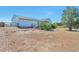 View of a large backyard with wooden fencing around the property and a grassy area at 1740 Territory Cir, Parker, CO 80138