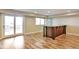 Spacious finished basement featuring a bar and sliding door to the outdoors at 1740 Territory Cir, Parker, CO 80138