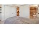 Bedroom with gray comforter and access to bathroom and recreation room featuring a pool table at 1740 Territory Cir, Parker, CO 80138