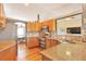 Kitchen featuring stainless steel appliances, granite countertops, and wood cabinetry at 1740 Territory Cir, Parker, CO 80138