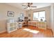 Bright and spacious office with hardwood floors and plenty of room for desks and storage at 1740 Territory Cir, Parker, CO 80138