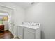 Functional laundry room with washer and dryer, conveniently located inside the home at 7868 Downing St, Denver, CO 80229
