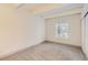 Neutral carpet and painted walls throughout this bright bedroom with closet at 9700 E Iliff Ave # C20, Denver, CO 80231