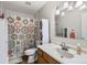 Bright bathroom with a shower, stylish fixtures, and ample storage space at 1011 Uvalda St, Aurora, CO 80011