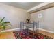 Dining Area with a modern table and chairs, set on a colorful rug at 12520 W Virginia Ave, Lakewood, CO 80228