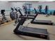 Well-equipped gym featuring treadmills, elliptical machines, and other fitness equipment at 12520 W Virginia Ave, Lakewood, CO 80228