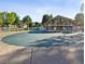 View of community clubhouse and fenced pool with cover at 12520 W Virginia Ave, Lakewood, CO 80228