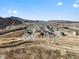 New construction homes being built near a lake, mountains, and a highway on a sunny day at 14422 Pansy Loop, Morrison, CO 80465