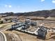 An aerial view of new residential construction homes with mountain views and natural surroundings at 14422 Pansy Loop, Morrison, CO 80465