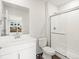 Clean bathroom featuring a glass shower and a sleek vanity at 14422 Pansy Loop, Morrison, CO 80465