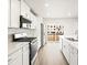 Bright kitchen with sleek appliances, island, and ample counter space at 14422 Pansy Loop, Morrison, CO 80465