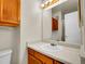 Bathroom features a white countertop, cabinet, and a well-lit mirror at 1094 S Dearborn St # 301, Aurora, CO 80012