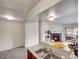 View from kitchen of cozy living room with fireplace and outdoor access at 1094 S Dearborn St # 301, Aurora, CO 80012