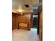 Basement showing wood paneled walls, tiled floors and an access to the staircase at 2060 S Washington St, Denver, CO 80210