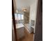 Bathroom with a vanity, a window and a built-in cabinet beside the tub at 2060 S Washington St, Denver, CO 80210