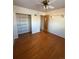 This is a nice bedroom with hardwood floors and a closet at 2060 S Washington St, Denver, CO 80210