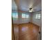 This is a nice bedroom with hardwood floors and a ceiling fan at 2060 S Washington St, Denver, CO 80210