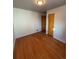 This is a nice bedroom with hardwood floors and natural light at 2060 S Washington St, Denver, CO 80210