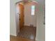 Hallway entrance features decorative flooring and a textured-glass window at 2060 S Washington St, Denver, CO 80210