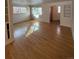 Spacious living room with hardwood floors, built-in shelves and an entryway at 2060 S Washington St, Denver, CO 80210