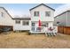 House exterior showcasing backyard deck and landscaping at 9506 Castle Ridge Cir, Highlands Ranch, CO 80129