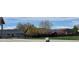 Neighborhood view featuring rooftops, trees, and glimpses of the surrounding mountain landscape at 7108 Morrison Dr, Frederick, CO 80530