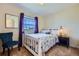 Bright bedroom with a large window, neutral walls, and comfortable furnishings for a relaxing and peaceful atmosphere at 7716 Shenandoah Dr, Elizabeth, CO 80107