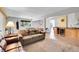 Finished basement area with entertainment area, seating, and wet bar at 6979 Weasel Way, Evergreen, CO 80439