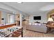 Finished basement with games, seating, bar, and an entertainment area at 6979 Weasel Way, Evergreen, CO 80439