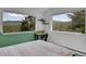 Bright bedroom with mountain views, decorative shelves, and a comfortable bed at 6979 Weasel Way, Evergreen, CO 80439