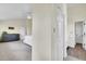 Spacious main bedroom featuring neutral carpet, ensuite bathroom, and closet at 6979 Weasel Way, Evergreen, CO 80439