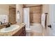 Bathroom with tiled shower, granite vanity, and a bathtub with shower at 10631 Autumnsong Ct, Highlands Ranch, CO 80126