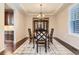 Elegant dining room featuring hardwood floors and a classic chandelier at 10631 Autumnsong Ct, Highlands Ranch, CO 80126