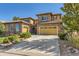 Stunning two-story home featuring a spacious driveway and attached garage at 10631 Autumnsong Ct, Highlands Ranch, CO 80126