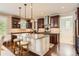 Elegant kitchen with granite countertops, stainless steel appliances, and custom cabinetry at 10631 Autumnsong Ct, Highlands Ranch, CO 80126
