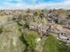This aerial view highlights the home's location near a park and trails at 683 Sunnyside St, Louisville, CO 80027