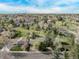 Expansive aerial view showcasing the neighborhood, lush greenery, and a serene environment at 683 Sunnyside St, Louisville, CO 80027