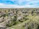 Beautiful wide-angle shot showcases home in established, tree-filled neighborhood at 683 Sunnyside St, Louisville, CO 80027