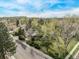 The property is surrounded by mature trees providing ample shade at 683 Sunnyside St, Louisville, CO 80027
