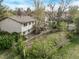 Spacious backyard featuring a large deck, mature trees and green space, perfect for outdoor entertaining at 683 Sunnyside St, Louisville, CO 80027