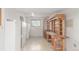 Spacious basement area with storage cabinets, workbenches, and natural light from the window at 683 Sunnyside St, Louisville, CO 80027
