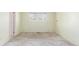 Empty bedroom space with neutral walls and carpeted floors that need repair and updating at 683 Sunnyside St, Louisville, CO 80027