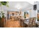 Bright kitchen featuring stainless steel appliances, an island, and wooden cabinets at 16277 Blueleaf Pl, Parker, CO 80134