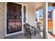 Inviting front porch featuring seating, offering a relaxing outdoor space at 16277 Blueleaf Pl, Parker, CO 80134