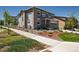 Attractive two-story home showcasing a well-maintained exterior and landscaping at 8102 Adams Fork Ave, Littleton, CO 80125