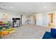Upstairs bonus room featuring neutral carpet and views to the staircase at 8102 S Adams Fork Ave, Littleton, CO 80125