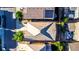 Aerial view of neighborhood and roof with solar panels at 12652 Glencoe St, Thornton, CO 80241