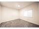Carpeted bedroom with bright white walls and natural light at 12652 Glencoe St, Thornton, CO 80241