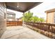 Covered outdoor patio offers a comfortable space for relaxation and entertaining at 12652 Glencoe St, Thornton, CO 80241