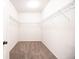 Spacious walk-in closet with carpet flooring and wire shelving at 12652 Glencoe St, Thornton, CO 80241